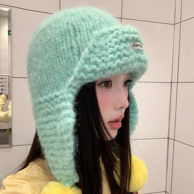 Cute green knitted hairball ear protection hat women's autumn and winter Korean flying hat wool hat warm Lei Feng hat tide
