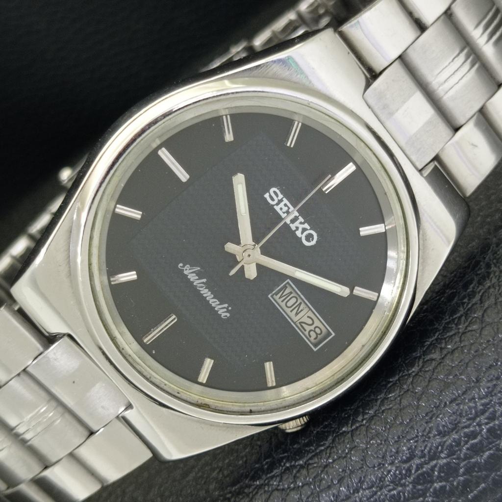 

GENUINE VINTAGE SEIKO AUTOMATIC 7009A JAPAN MENS BLACK DIAL WATCH a701593-5 R206b-a701593