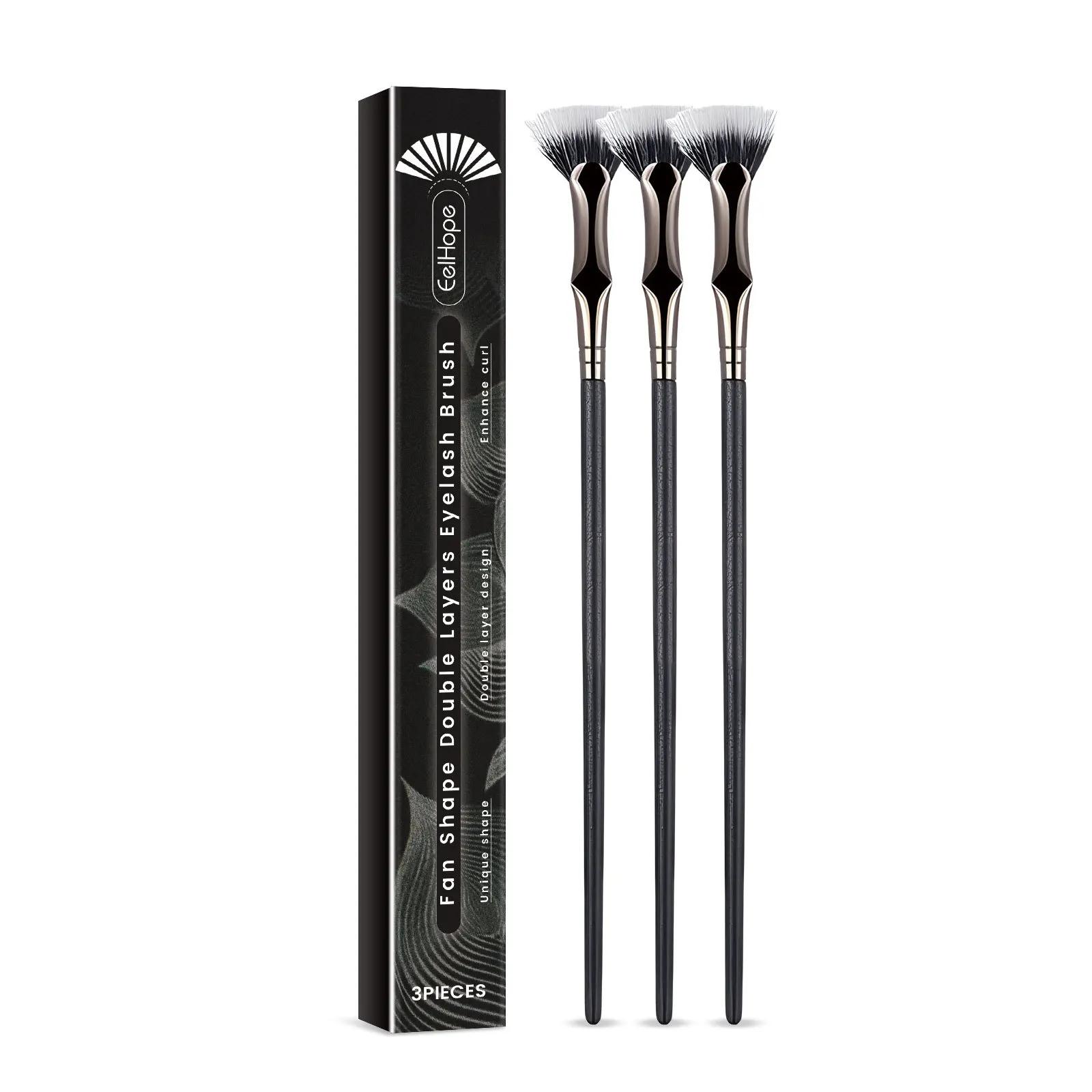 

Double layered angled fan-shaped eyelash grooming brush with distinct roots and slender lower eyelashes, eye combing brush