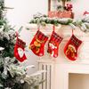 Decorative Red Christmas Stockings With Fun Cartoon Designs Of Santa Snowman Reindeer Bear For Vibrant Celebrations Festive