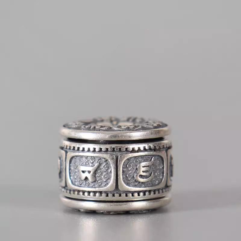 Bracciale con Perline Rotanti a Cilindro con il Mantra Tibetano delle Sei Sillabe e gli Otto Tesori Auspiciosi