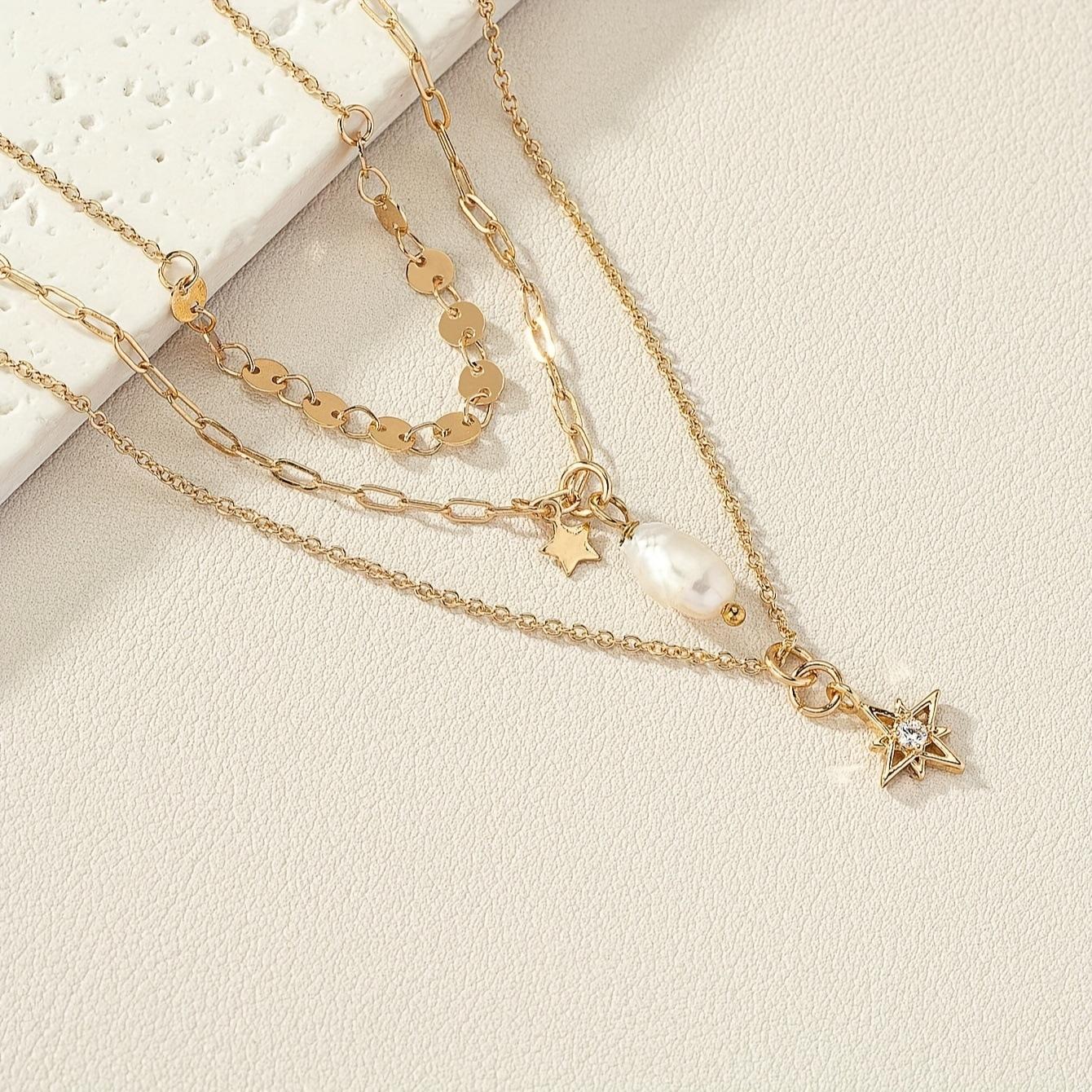 

A multi-layer golden yellow disc pearl inlaid with diamonds, five-star water drop pearl starlight gift necklace, fashion temperament