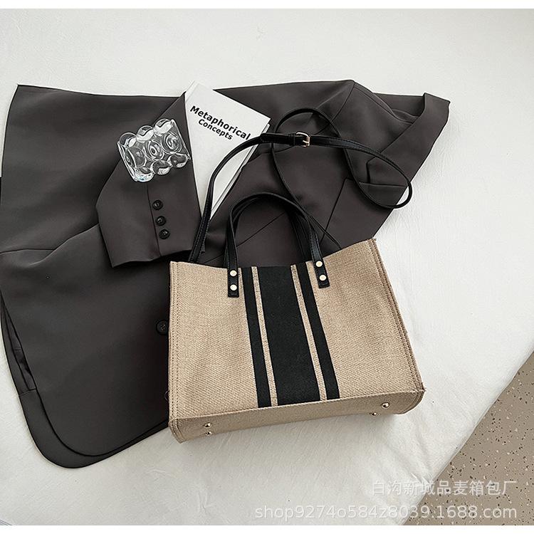 

Large capacity striped canvas bag casual versatile tote bag women s 2025 new fashion explosion commuter messenger bag