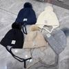 Cute and Versatile Age-reducing Big Hairball Ear Protection Wool Hat for Women, Warm and Thin In Autumn and Winter, Split-ended Knitted Lei Feng Hat