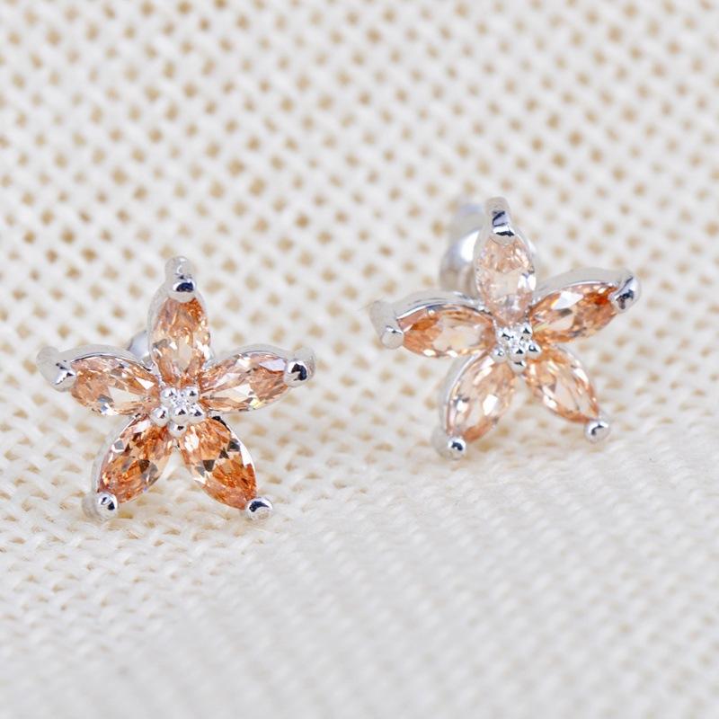 

Korean simple creative colored diamond petal stud earrings female fashion personality temperament Pinduoduo explosion