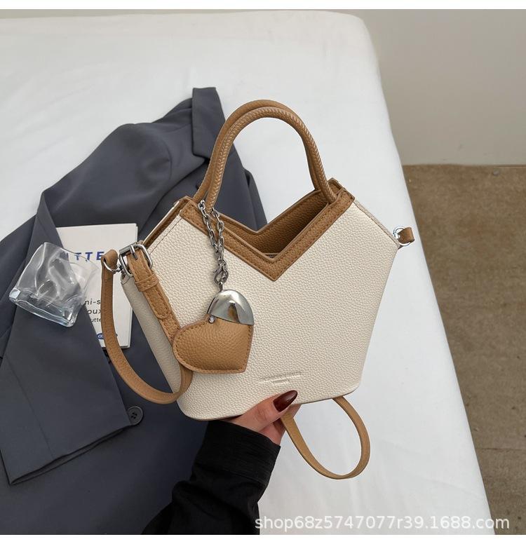 

Women s bag 2025 new fashion and versatile niche tote bag hand-held bucket bag foreign style one-shoulder crossbody bag trend