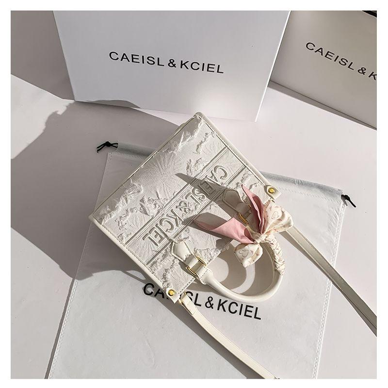 

Caeisl & Kciel Women s Bag Niche Tassel Tote Bag Women 2025 New Autumn and Winter High-Grade Portable Messenger Bag White small size New Product Price