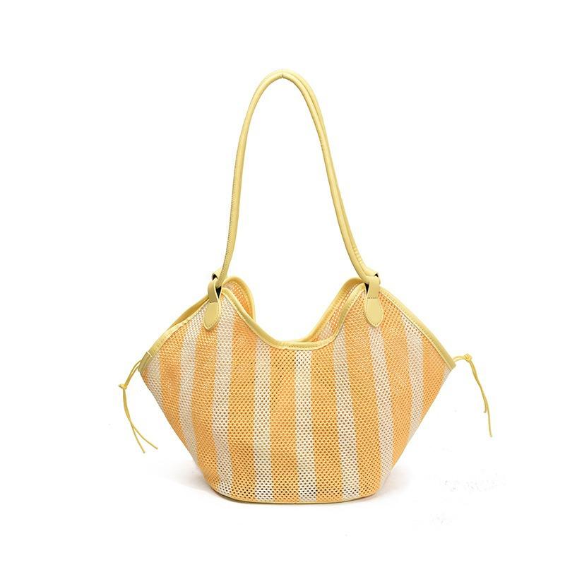 Textured hollow large-capacity bucket bag armpit bag for women as a new fashionable and versatile commuter woven tote bag