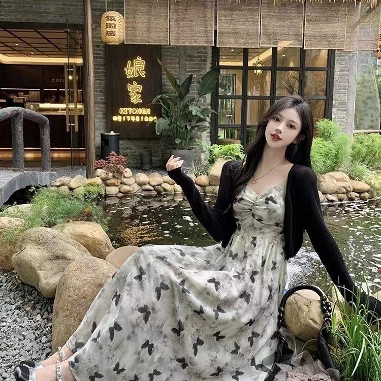 French gentle wind sleeveless dress women's summer design sense temperament waist printing A word suspender medium and long skirt