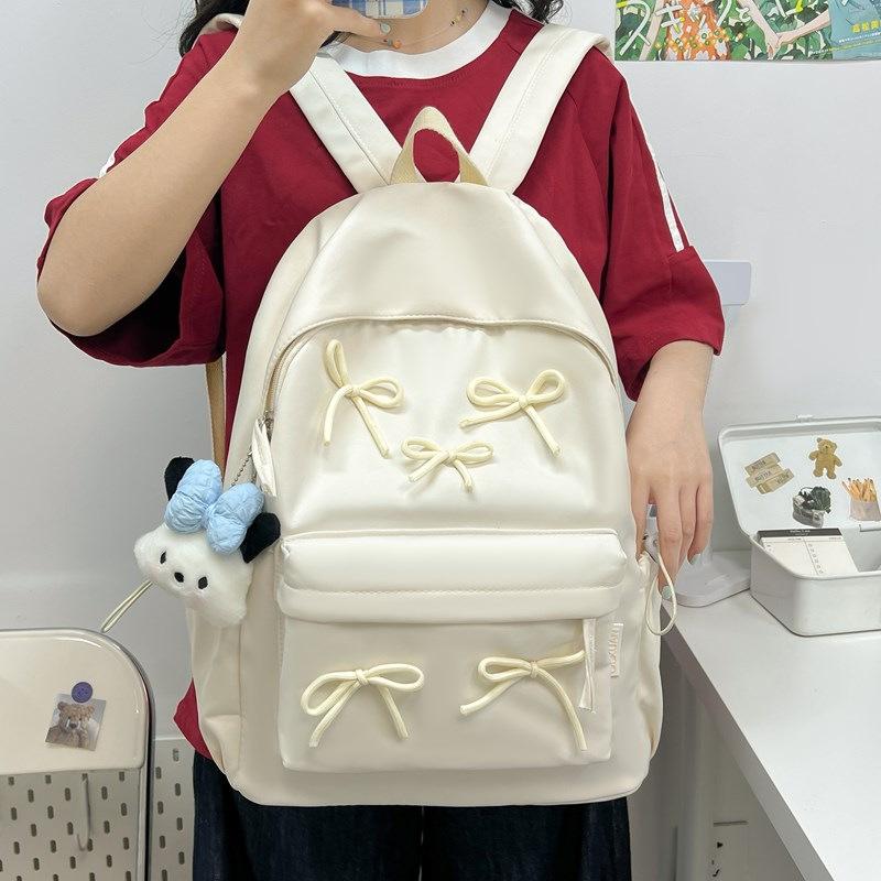 Schoolbag1011 new bow schoolbag girls versatile high value design sense backpack niche light fashion middle school students
