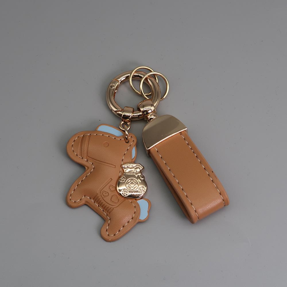 Instant Wealth Leather Keychain with Cartoon Pony Pendant for Couples – Trendy Bag and Car Accessory