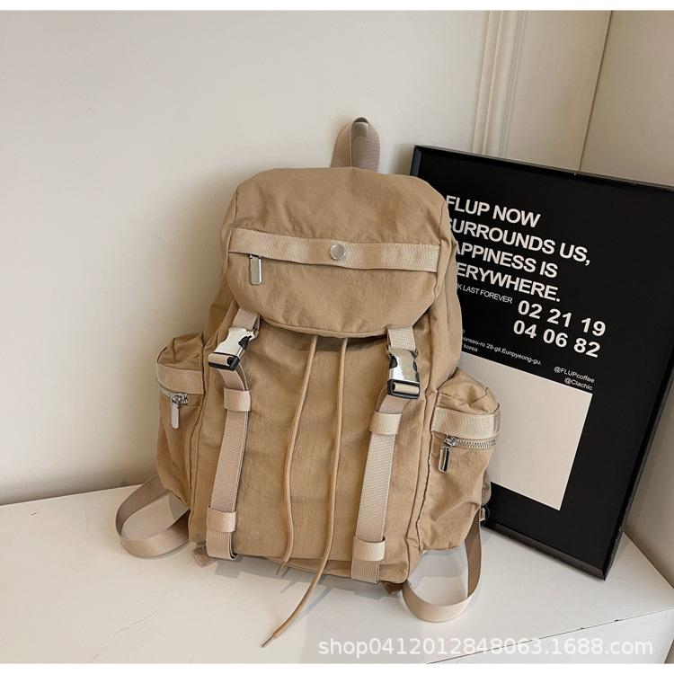 

Рюкзак Женская сумка Рюкзак Большая вместимость Школьная сумка Путешествия Кепка Мягкий Уличный тренд Нейлон Досуг Путешествия Да хаки