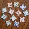 Hand-Painted Four-Pointed Star Ceramic Button – Handmade Clothing Accessory