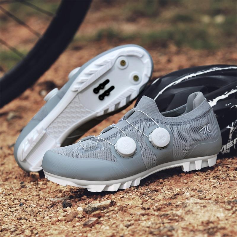 

Унисекс Велосипедные Туфли Совместимые с Pelotan/SPD Для Занятий в Помещении Дорожного Велосипеда Велосипедные Туфли с Включенными Шипами Delta для Мужчин Женщин 39 серый