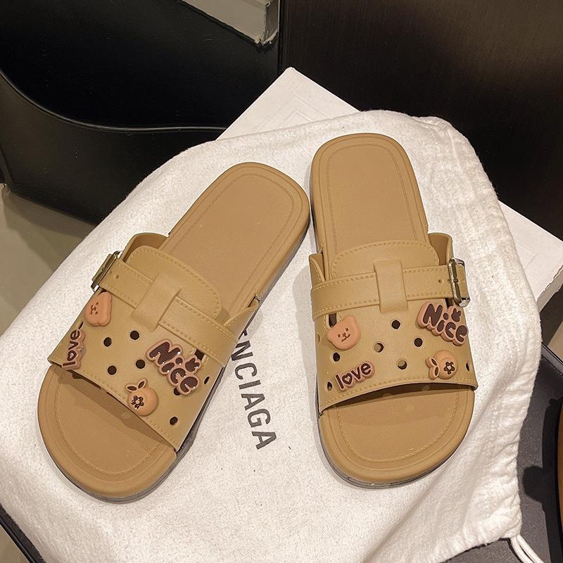 Flat-bottomed slippers women's new outer wear summer hollow soft bottom one-word drag with skirt high-end sandals