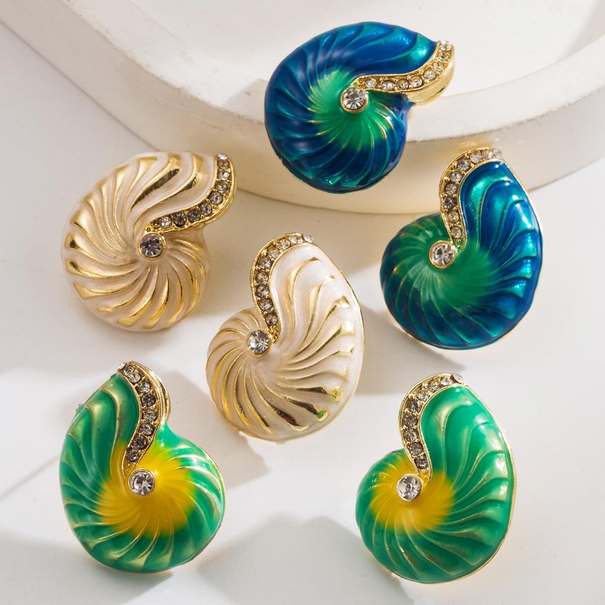 

Minimalist Exaggerated Personality Beach Vacation Style Conch Earrings European and American Trend New Metal Oil Drop Inlaid Diamond Stud Earrings синій