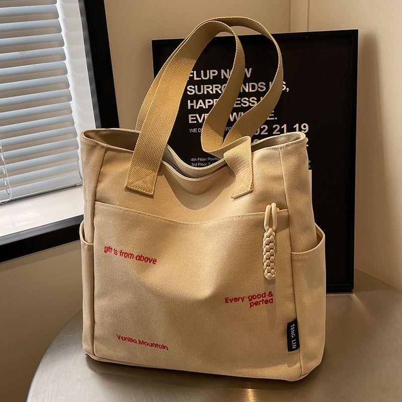 

New bag women s large-capacity new versatile leisure shoulder simple student class commuting tote bag