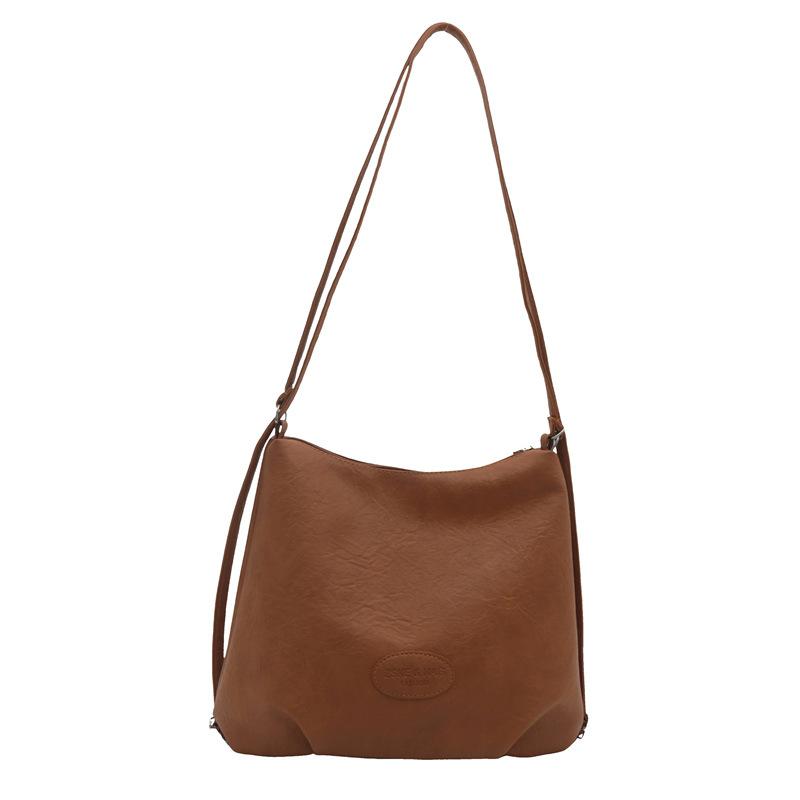 

Популярний повсякденний 2024 ретро новий великої місткості для поїздок на роботу однотонний трендовий багатофункціональний рюкзак, сумка-тоут на одне плече, жіноча сумка коричневий