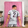 White jersey with "Hakimi" and number 2, set against a pink background. for all seasons blanket lunch break throw gift
