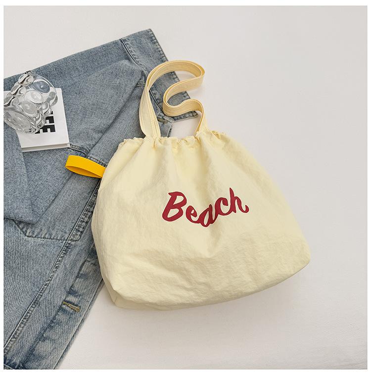 Spring and summer new fashionable large-capacity shoulder underarm bag female simple commuter student tote bag