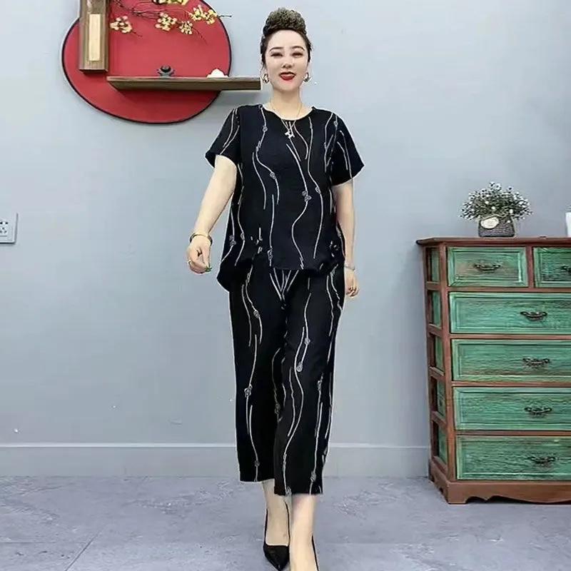 Letní bavlněné lněné obleky pro ženy středního věku Volné zahraniční trička s krátkým rukávem Módní ležérní oblečení pro matky středního věku