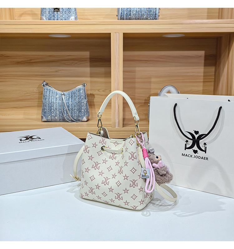 Women's Large Capacity Single Shoulder Bucket Bag with Inner Lining, Compartment Organizer, and Zippered Middle Section.