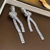 Zircon knotted long tassel silver needle earrings Korean niche elegant light luxury earrings 