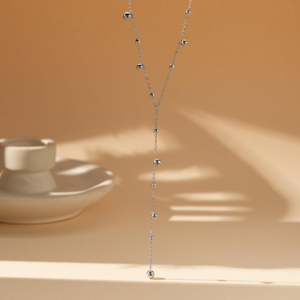 

Современное ожерелье из нержавеющей стали с позолотой 18 карат 2024 года с кисточками и бусинами для повседневной носки серебряный