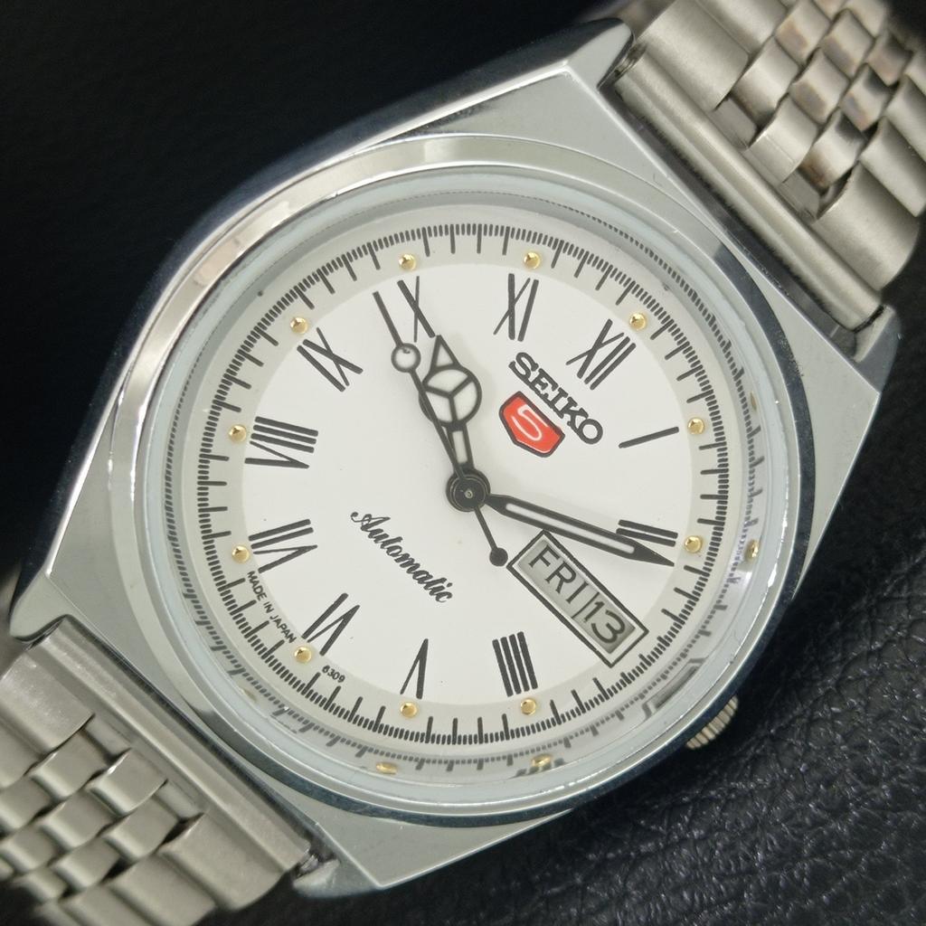 

АВТОМАТИЧЕСКИЕ ВИНТАЖНЫЕ ОТРЕСТАВРИРОВАННЫЕ МУЖСКИЕ ЧАСЫ SEIKO 5 ЯПОНИЯ С РИМСКИМИ ЦИФРАМИ a442637-1