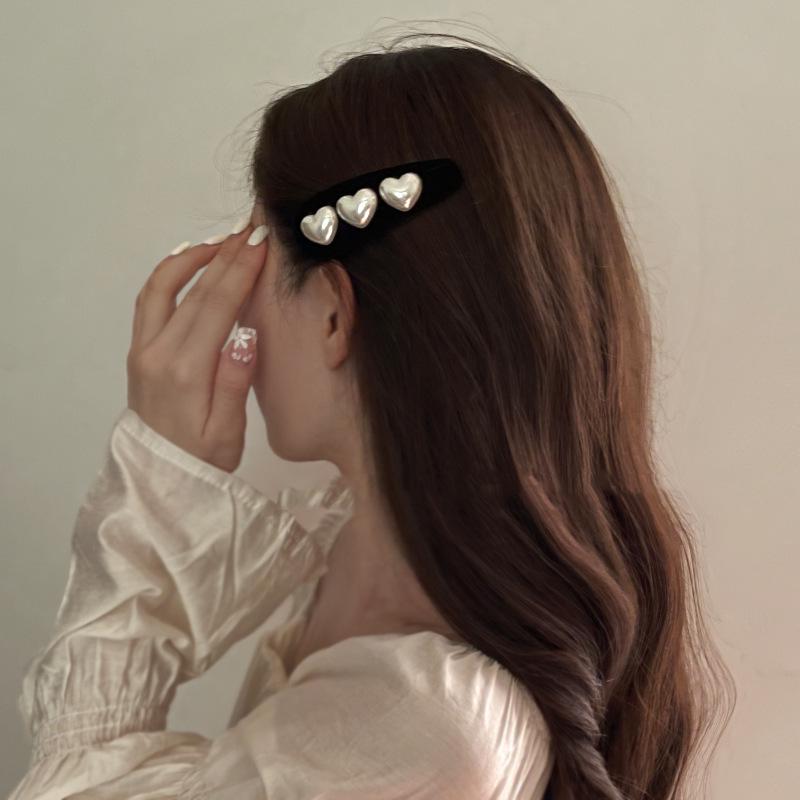 Premium Love Heart Hårnål: Elegant hårklipp for kvinner med enkel vanndråpedesign for elegant stil