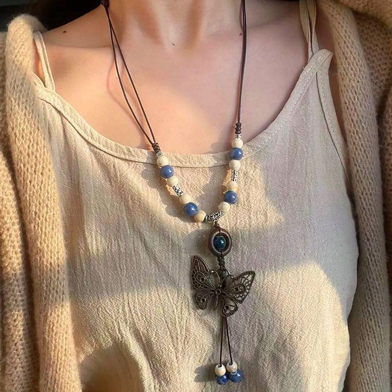 Long necklace, retro butterfly beaded, new Chinese Zen ethnic style stacked, long horse dress, versatile accessories