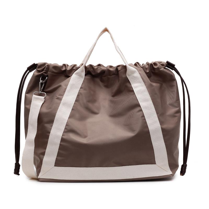 Lazy wind large-capacity bag women's spring and autumn fashion versatile handbag pumping mouth commuter bag shoulder messenger bag