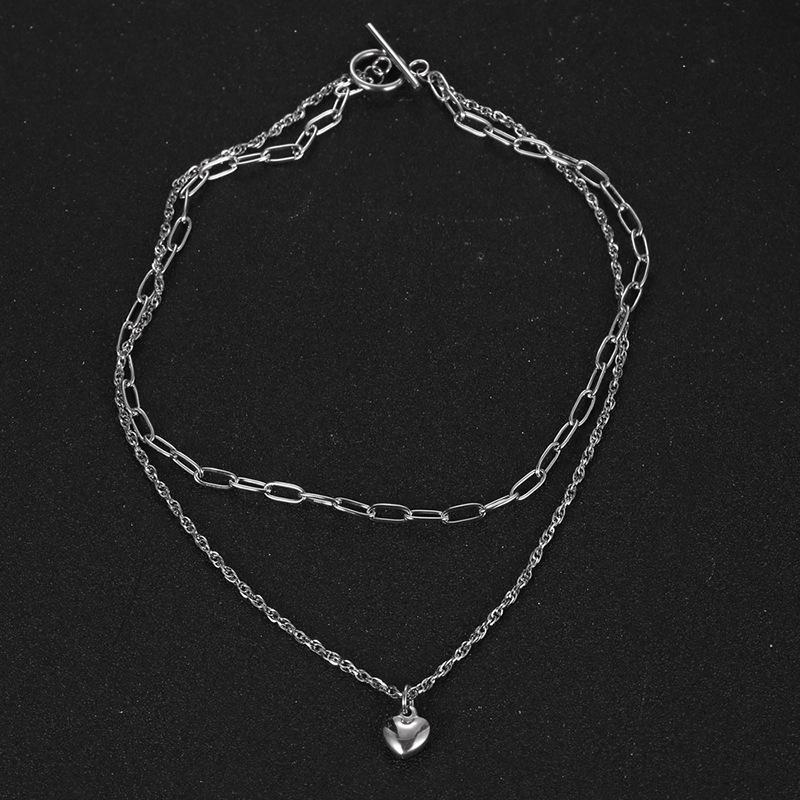 Nytt titanstål persikahjärthalsband dam hip-hop söt nisch dubbel-lager stack bär nyckelbenskedja