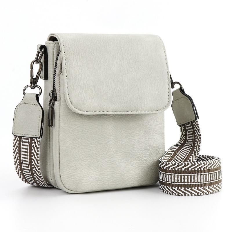 

Hot-selling mini messenger bag, portable mobile phone bag, multi-pocket card slot function, adjustable shoulder strap.