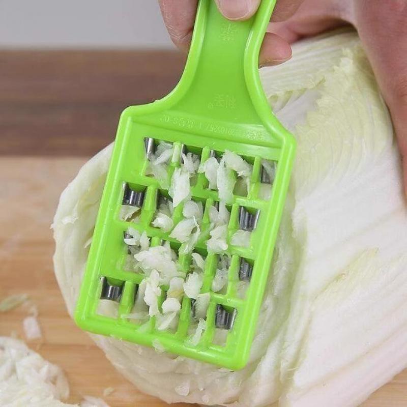 

A Cabbage Stuffing Knife, A Tool for Cutting Dumpling Fillings, A Grater Board, and Manual Stuffing зелёный