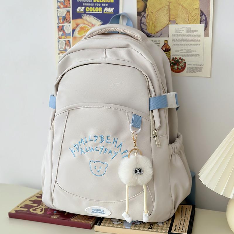 

Корейский вышитый нейлоновый рюкзак - Большая вместимость, модный повседневный дорожный и школьный рюкзак With Pendant серый