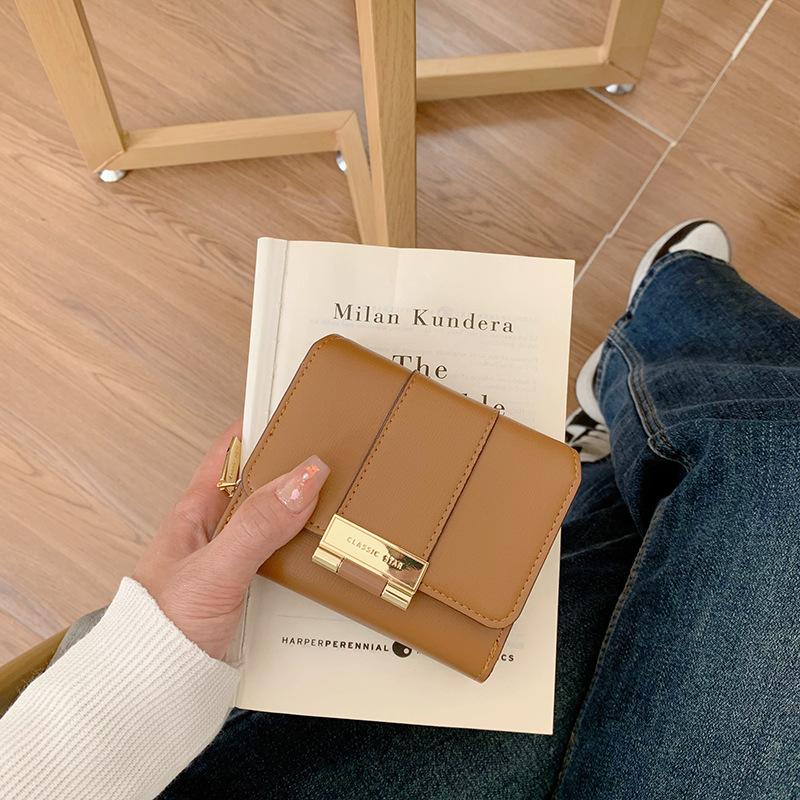 2025 новый маленький кошелек женский высококлассный маленький складной короткий на молнии трехсложенный клатч женский коричневый