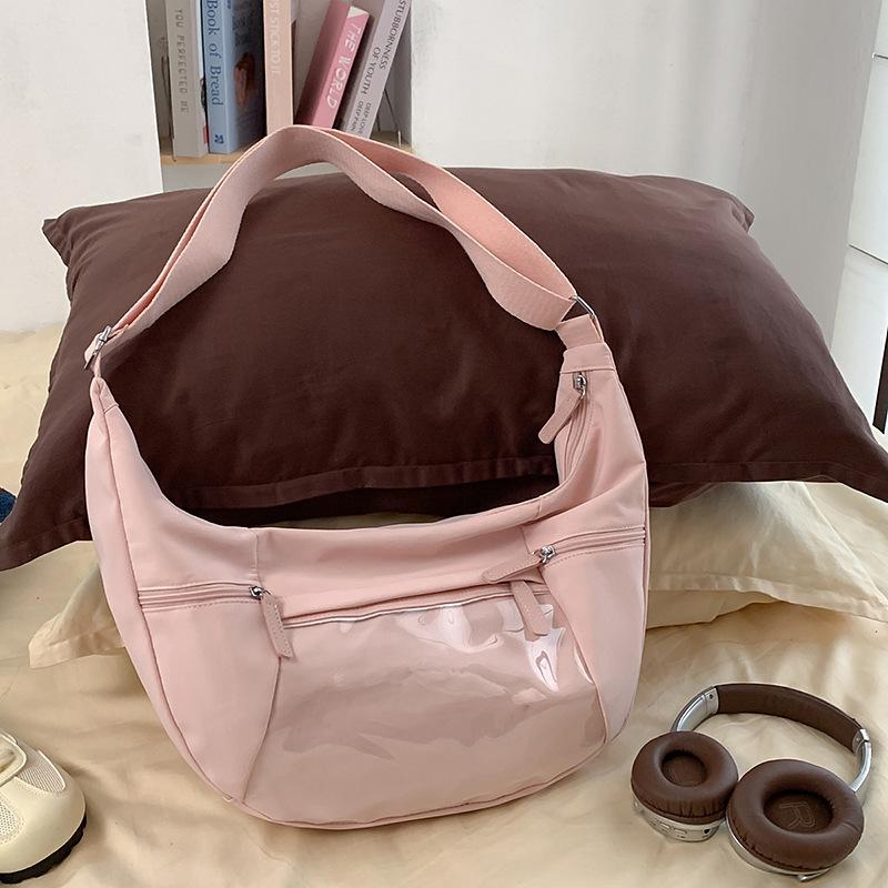 

2025 New Korean Style Crossbody Bag Women s Shoulder Bag Candy Student Large Capacity Lightweight Literary Men s Crossbody Bag рожевий