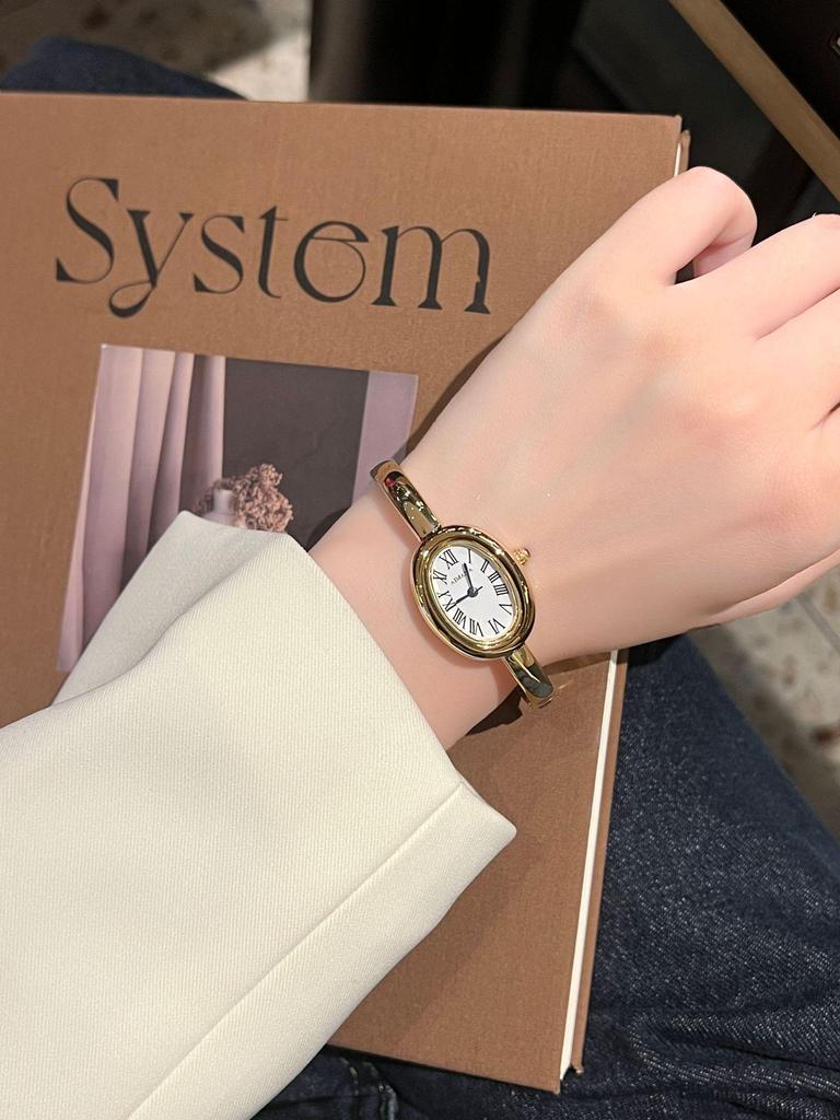AIMANA Women's Oval Quartz Bracelet Watch: Small Dial, Roman Numerals, Light Luxury Style.