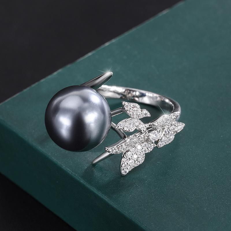 

Ювелирные изделия Медное основание Позолоченное Инкрустированная серая бусина Бабочка Ручная работа Бриллиантовая закрепка 14мм12мм