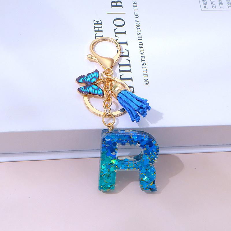 1 Stück Schriftzug Schlüsselanhänger für Rucksackanhänger Schlüsselanhänger Schlüsselring mit Quaste Schmetterling Niedlich Farbverlauf Harz Blau Pailletten