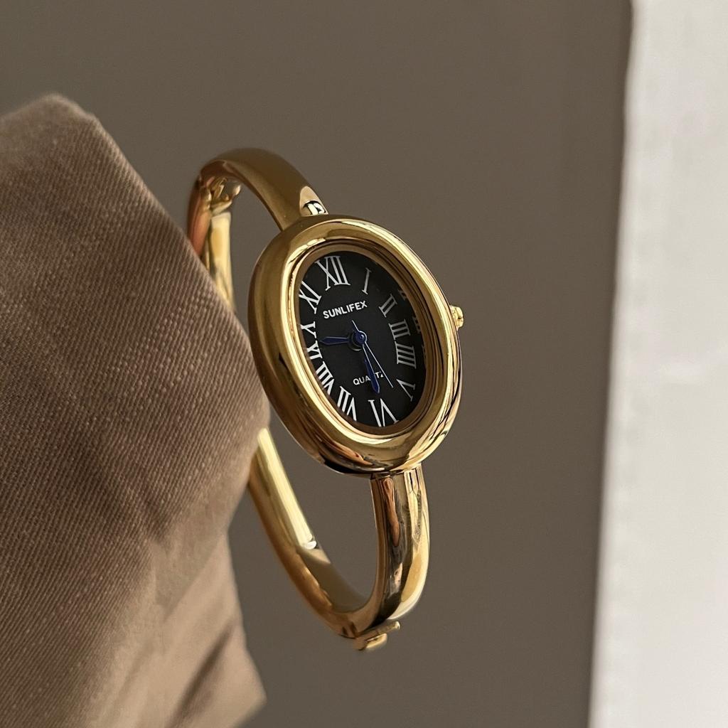 Dámské křemenné hodinky Luxusní římské číslice Reloj Minimalistické Jednoduché Oválné hodiny Dámské Nerezová ocel Orologio Zlaté pouzdro Náramkové hodinky