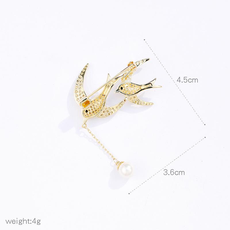 Swallow Brooch: Copper with Zircon and Pearl Pin