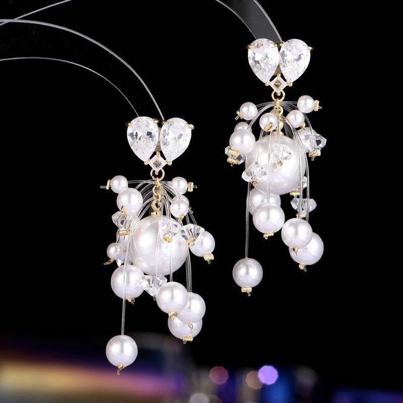 

Осенне-зимняя мода темперамент серьги темперамент модный дизайн чувство ниши элегантность супер сказочный свет роскошные жемчужные серьги золотой