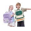Elevers tredelte ryggsekk for barneskole for å redusere belastningen og beskytte ryggraden
