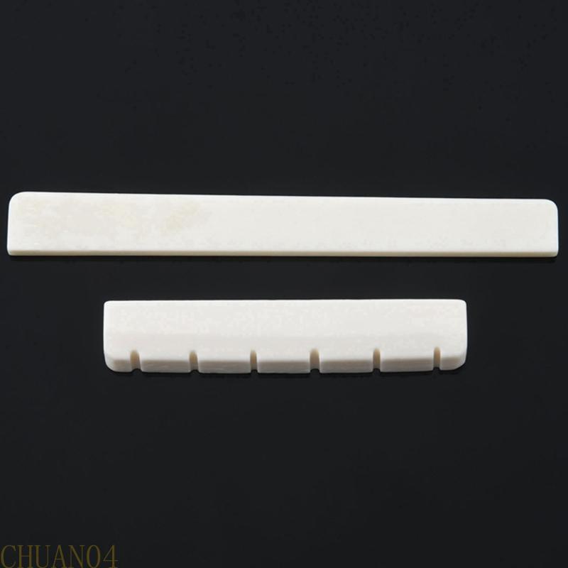 A1A2 2Pcs/lot Musical Instruments Bone Nut For Electric Guitar Bone Nut Saddle Guitar Parts White Guitar String Pillow