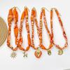 Orange Bandanahalsband med Rostfritt Stålberlock Boho Halsduk Choker med Sol, Ballonghund, Hjärta, Snäckskalsberlock