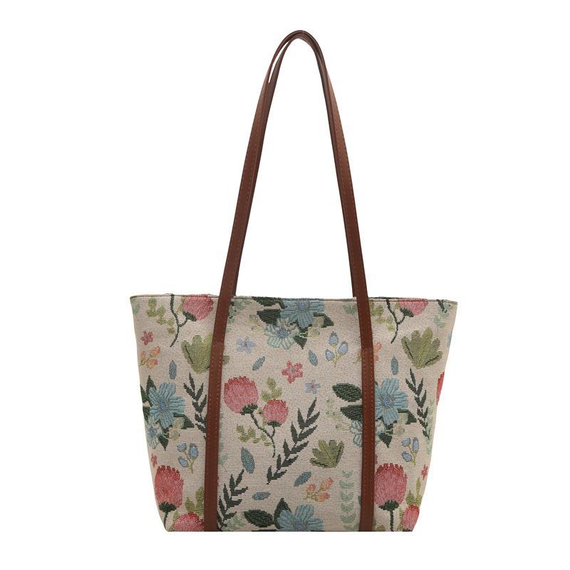 Beautiful casual niche design sense flower texture high sense temperament large capacity shoulder armpit bag