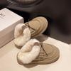 In the winter of 2024 thick-soled wool snow boots for women are heightened and thickened to keep warm and half-towed hairy slippers for women