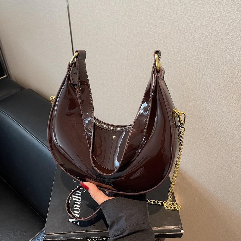 Nische 2025 Frühling neue High-End Handtasche Design Sinn Satteltasche schlicht glänzend Achsel Messenger Bag Tasche Frauen